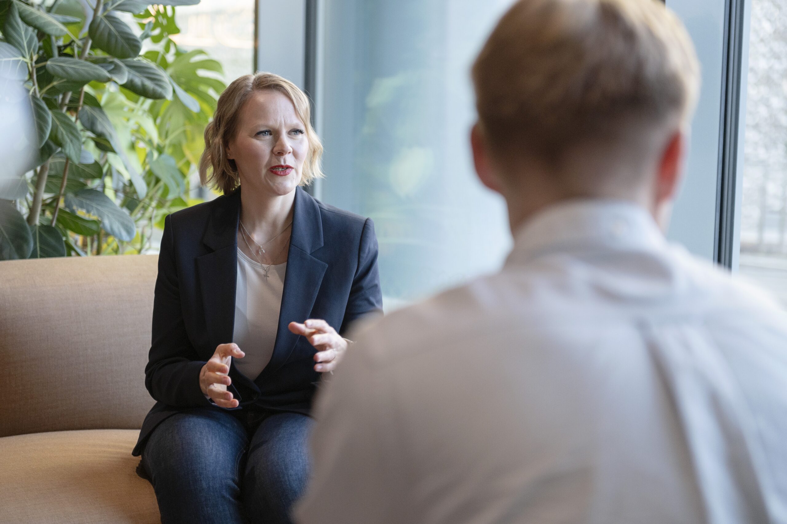 Discussion between two people in an office environment at Enersense