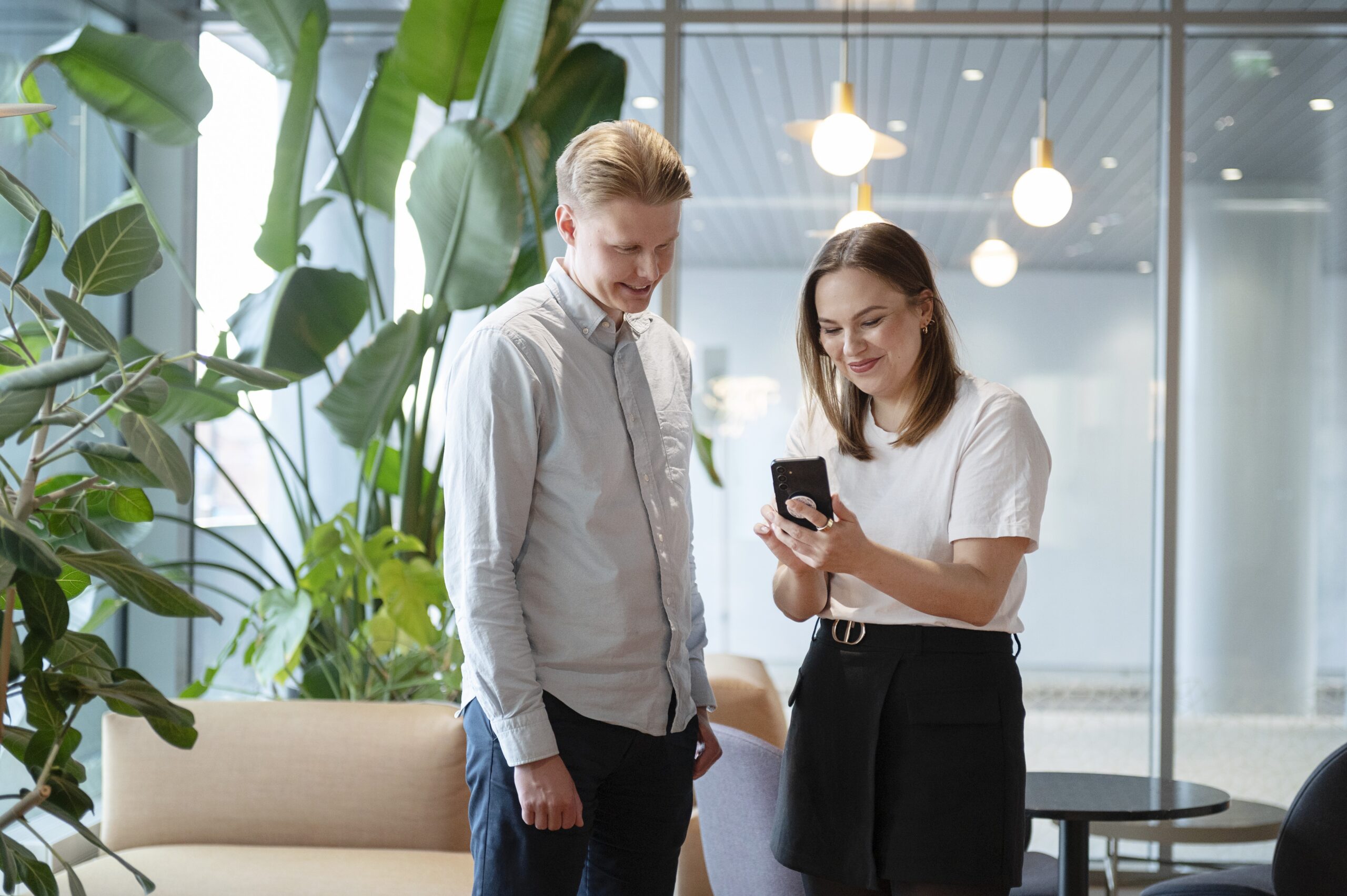 Enersense employees collaborating in an office environment